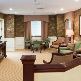 A well-furnished living room featuring cozy seating and elegant decor.