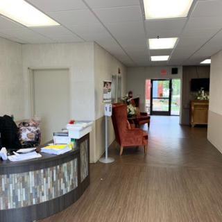 A view of an office reception area with a welcoming waiting space.
