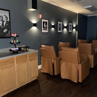 A modern home theater with comfortable seating and stylish decor.
