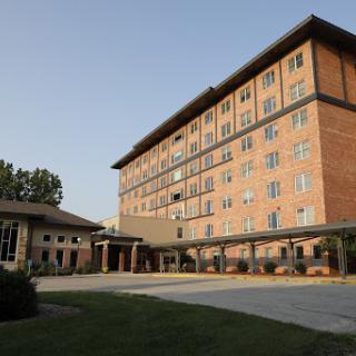 A modern hotel building showcasing contemporary architecture.