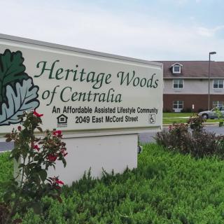 The entrance sign of Heritage Woods of Centralia, an affordable assisted living community.