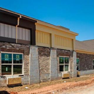 A newly constructed residential building with a modern architectural design.