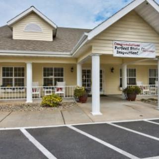 The exterior of a preschool and daycare center with a welcoming entrance.