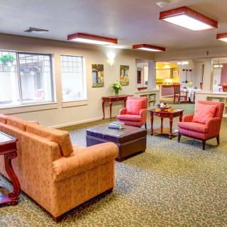 A cozy lobby area with comfortable seating and warm lighting.