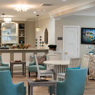 A modern living room with comfortable seating and elegant decor.