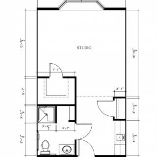 A detailed floor plan showcasing the layout of a room with labeled dimensions and areas for various facilities.