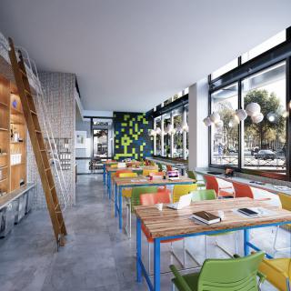 A modern cafe interior with colorful chairs and ample natural light.
