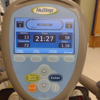 Digital display of a NuStep cardio machine showing workout progress and statistics.