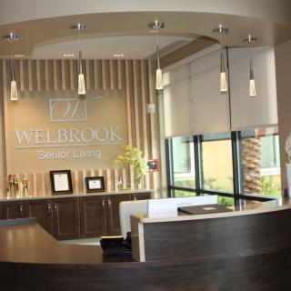 Modern office reception area with elegant lighting and decor.