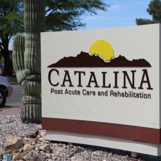 Sign for Catalina Post Acute Care and Rehabilitation with a cactus in the background.