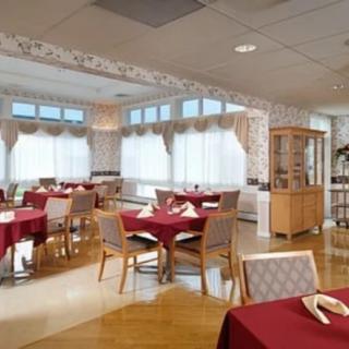 A cozy restaurant dining area with tables set for service.