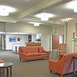 A modern and welcoming lobby area featuring comfortable seating arrangements.