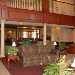 A cozy hotel lobby with comfortable seating and elegant decor.