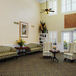 A spacious living room with comfortable seating and tasteful decor.