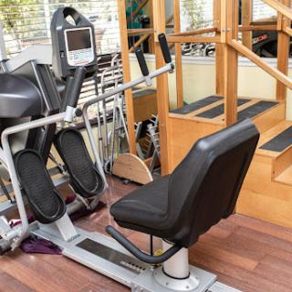 An elliptical machine situated in a gym, ready for a workout session.