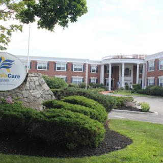 Exterior view of a healthcare facility with well-maintained landscaping.