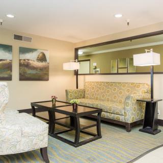 A cozy hotel lobby with comfortable seating and elegant decor.