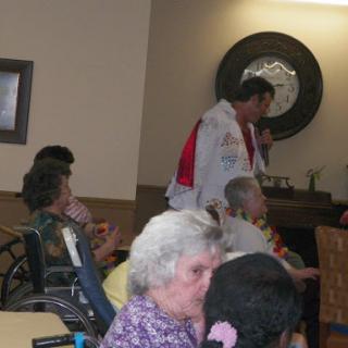 A lively performance for seniors at a nursing home, bringing joy and entertainment to the residents.