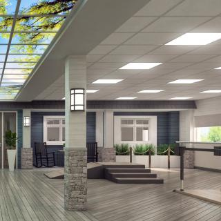 A modern open lobby with skylights and natural lighting.