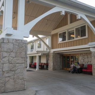 A welcoming entrance showcasing modern architectural design with stone accents.