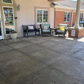 A cozy outdoor patio area with seating, perfect for relaxation.