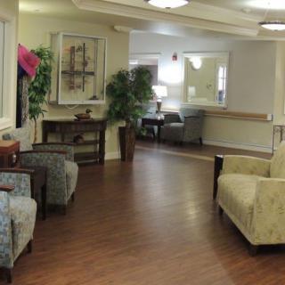 A comfortable lobby area with seating and decor.