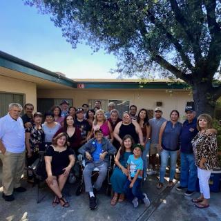 A joyful family gathering under the sun, creating lasting memories together.
