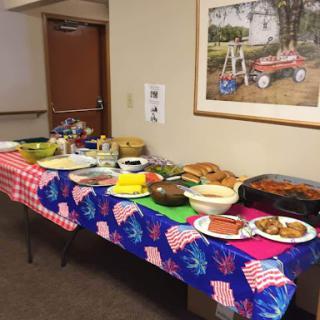 A festive buffet setup featuring a variety of dishes for a gathering.