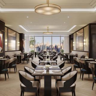 A modern and elegant restaurant dining area with stylish decor and chandeliers.