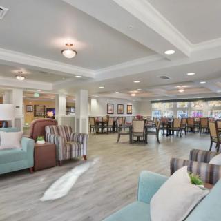 A spacious and modern lobby with comfortable seating and elegant lighting.