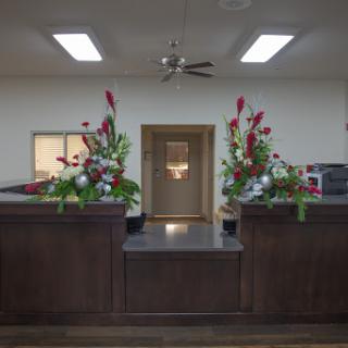 A welcoming reception area featuring vibrant floral arrangements.