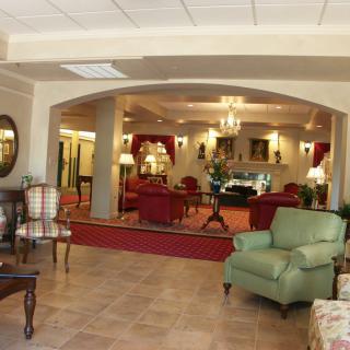 A luxurious hotel lobby with comfortable seating and elegant lighting.