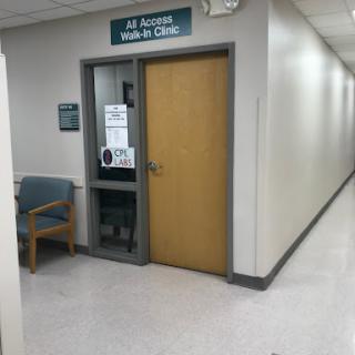 Entrance to a medical clinic with seating in the waiting area.
