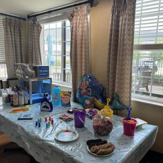 A festive setup featuring snacks and decorations for a gathering.