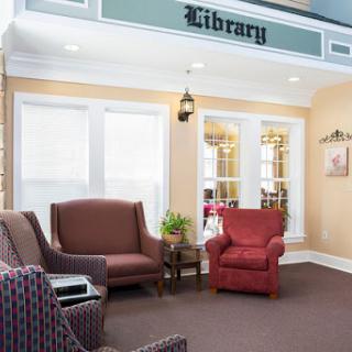 A cozy library interior featuring comfortable seating and a welcoming atmosphere.