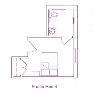 Studio apartment floor plan with bathroom and living area.