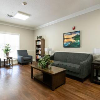 A cozy living room with comfortable seating and modern decor.