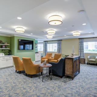 A modern living room with comfortable seating and stylish decor.