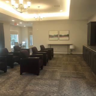A modern lounge area with comfortable seating and elegant decor.