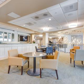 A modern lobby area with comfortable seating and elegant interior design.