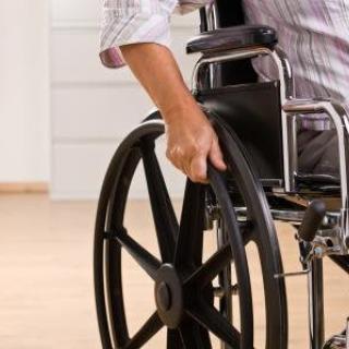 A person using a wheelchair indoors.