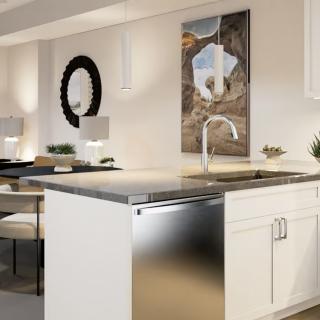 Modern kitchen with sleek countertops and stylish decor.