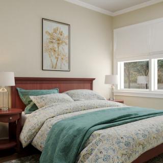 A cozy bedroom with a bed, bedside tables, and a floral painting on the wall.