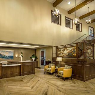A well-designed hotel lobby with comfortable seating and elegant lighting.