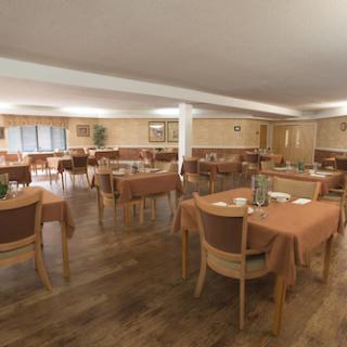 A spacious and elegantly designed dining area ready for guests.