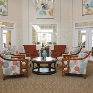 A cozy living room with modern furniture and decor.