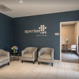 A modern waiting room with seating and a welcoming atmosphere.