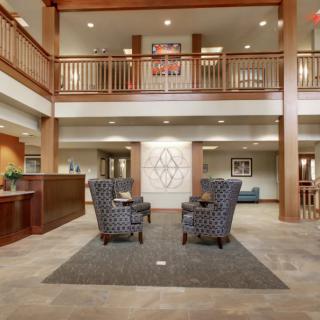 A modern lobby with comfortable seating and elegant architectural details.