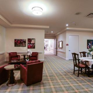 A cozy waiting area with comfortable seating and decor.