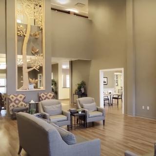 Modern living room with comfortable seating and elegant decor.